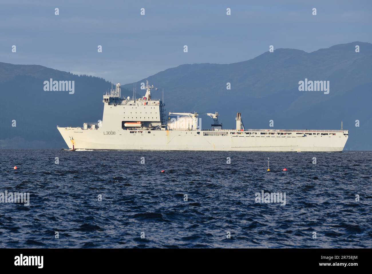 RFA Mounts Bay is a Bay-class auxiliary landing ship dock of the Royal Fleet Auxiliary sailing here on the Clyde estuary in Scotland Stock Photo