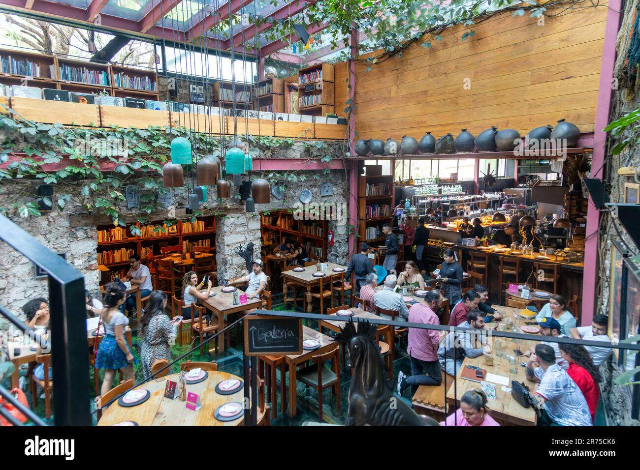 People at lunchtime inside Tetetlan Galeria restaurant, Jardines del ...