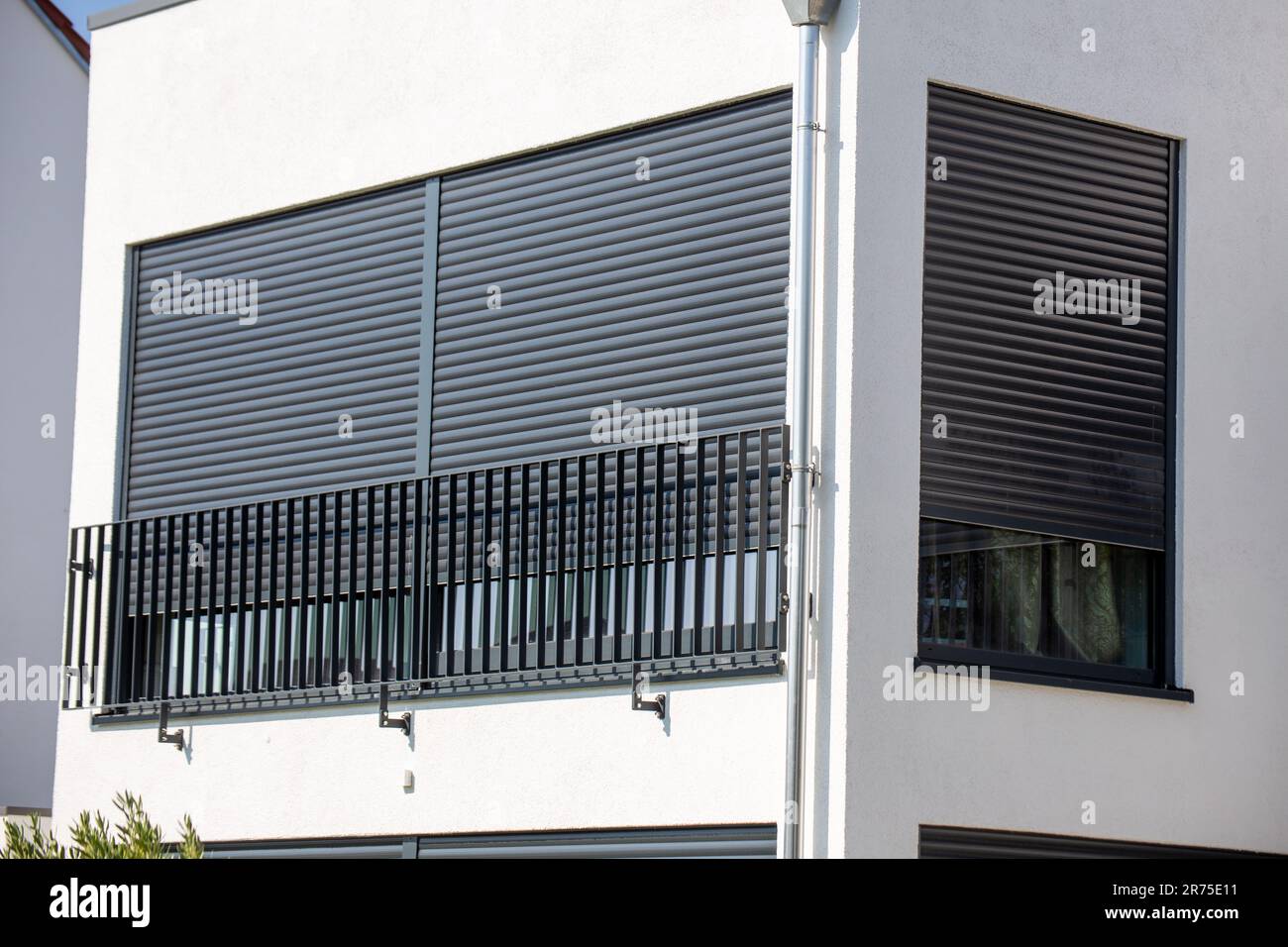 Shutter In Building Electric aluminium roller shutter on a new residential building Stock ...