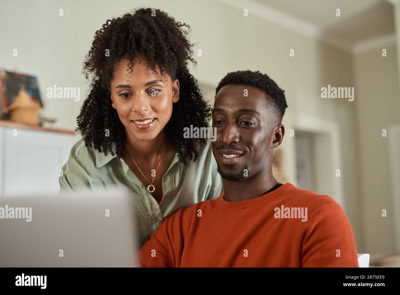 African american couple smiling using hi-res stock photography and ...
