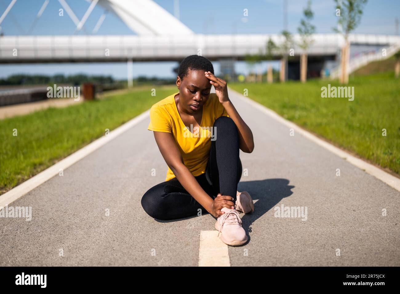 Woman injury ankle street hi-res stock photography and images - Alamy