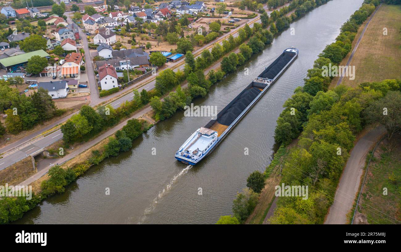 Cargo ship with coal for Dillinger Hütte (Dillingen, Saarland) on the river Saar near Kastel-Staadt, Saartal, Rhineland-Palatinate, Germany Stock Photo