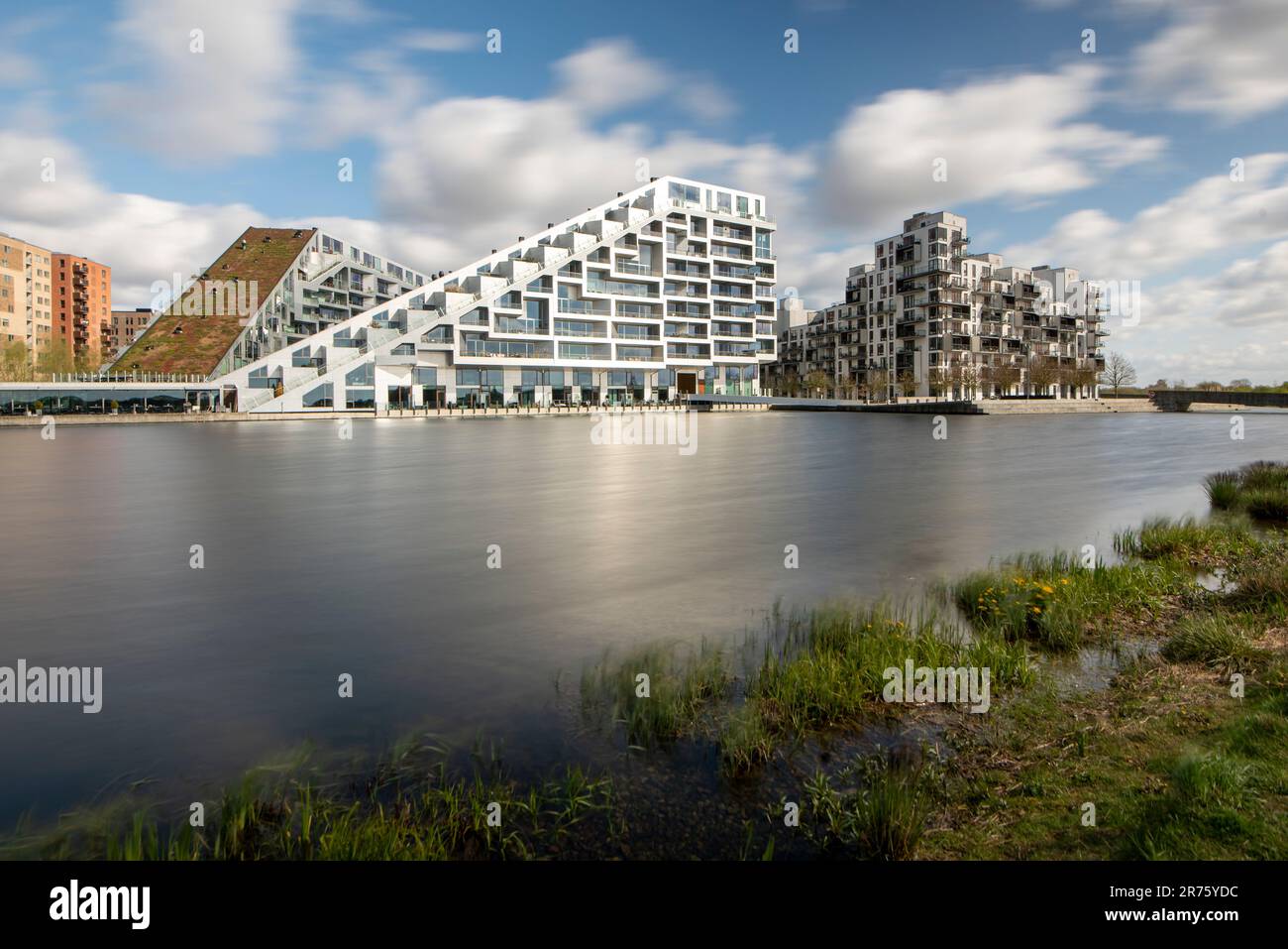 Residential complex 8 House, designed by architectural firm Bjarke Ingels Group (BIG), is located in the new district Orestad, Copenhagen, Denmark. Stock Photo