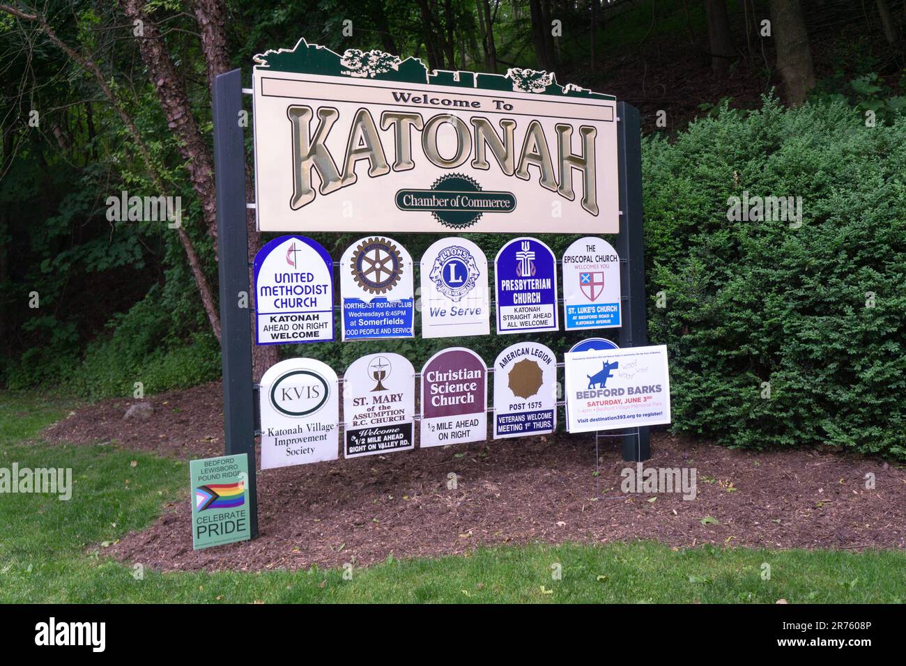 A to Katonah sign on the side of a road with notices from