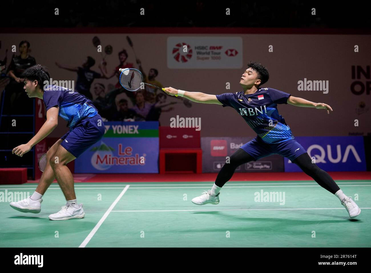 Indonesia's Leo Rolly Carnando, right, and Daniel Marthin play against  Japan's Ayato Endo and Yuta Takei during their men's doubles round of 32  match at Indonesia Open badminton tournament at Istora Stadium