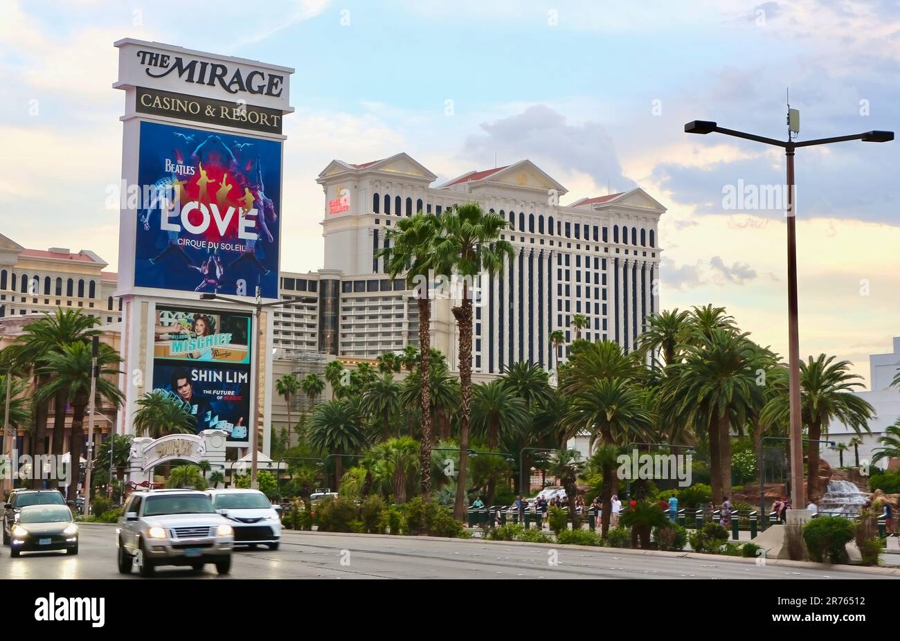 Sign for The Mirage hotel and casino with Caesar's Palace hotel and