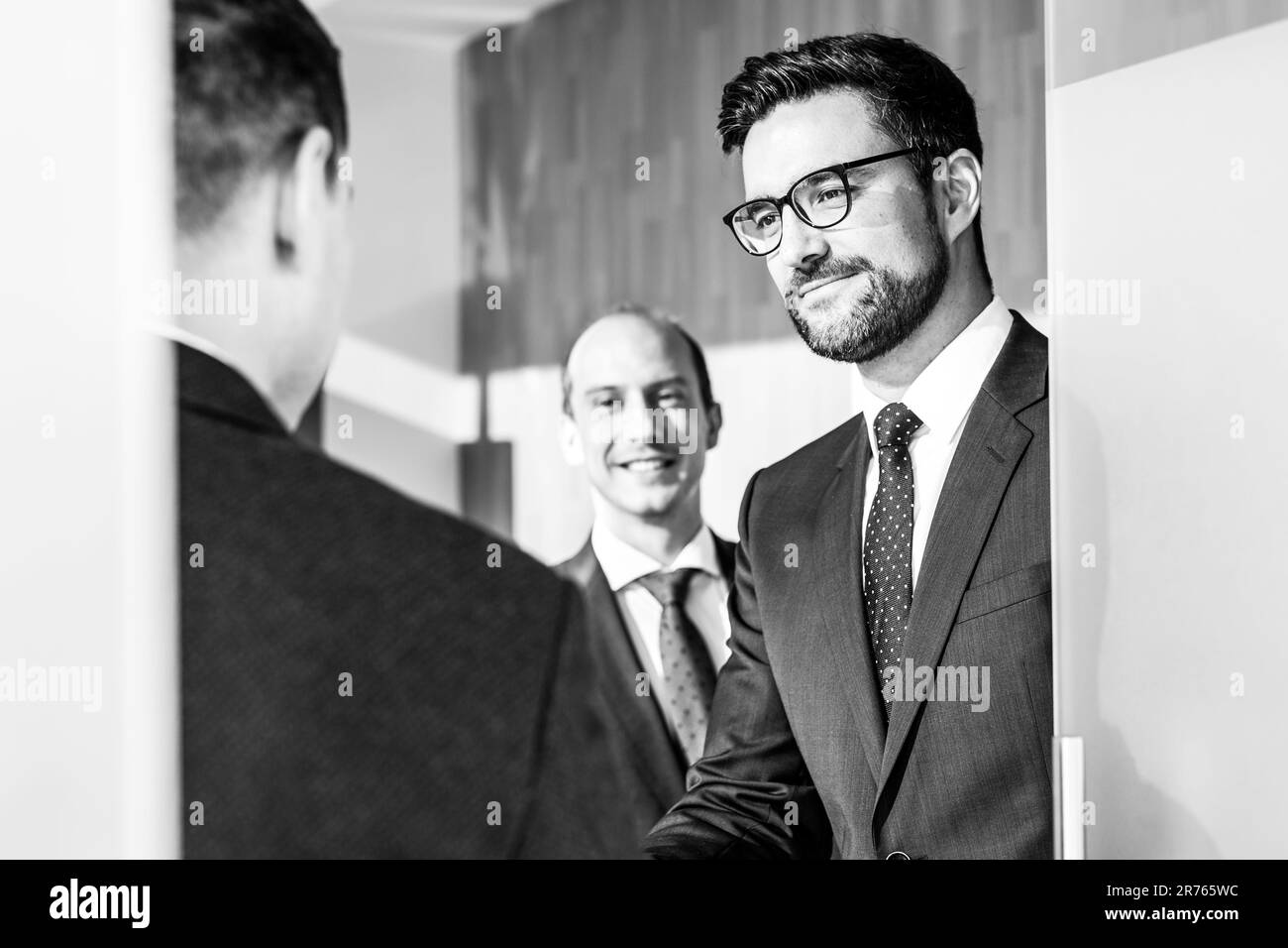 Interview greeting Black and White Stock Photos & Images - Alamy