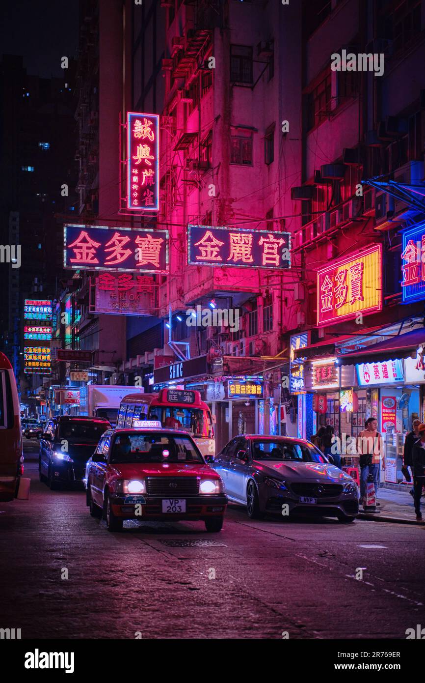 Mong Kok, Hong Kong - April 12 2023: A Traditional red Taxi and