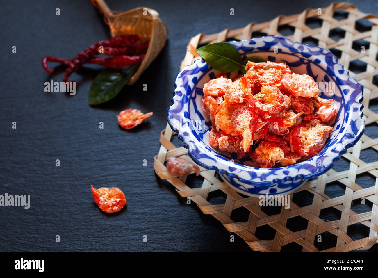 Asian Food concept Dried Shrimps in traditional tray with pedestal on