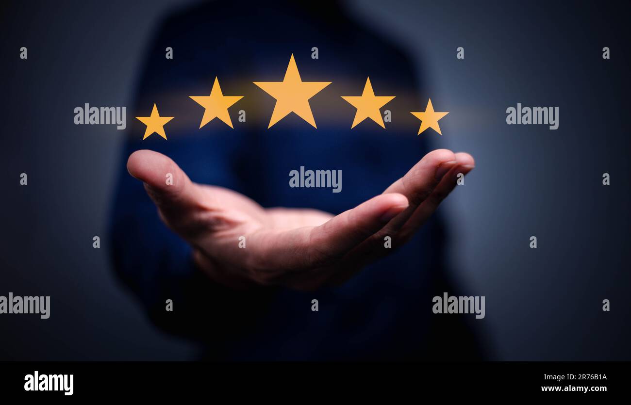 Customer evaluation feedback.men in suit Giving Positive Review for Client's Satisfaction Surveys.giving a five star rating. Service rating, satisfact Stock Photo