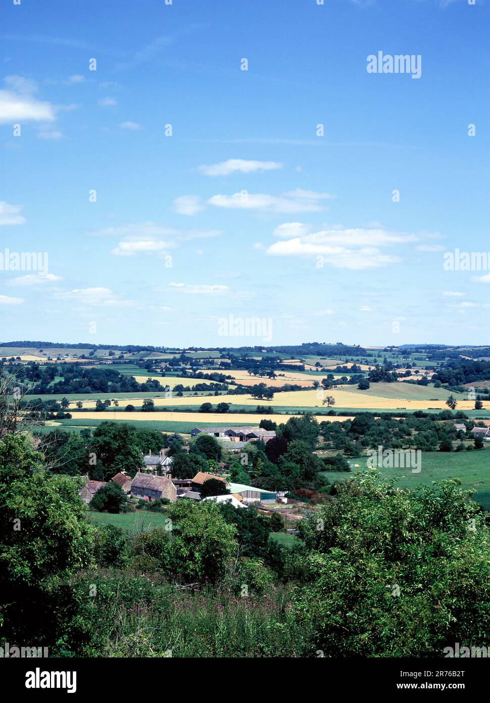 England. Somerset. South Cadbury. View of rural countryside & farmhouse
