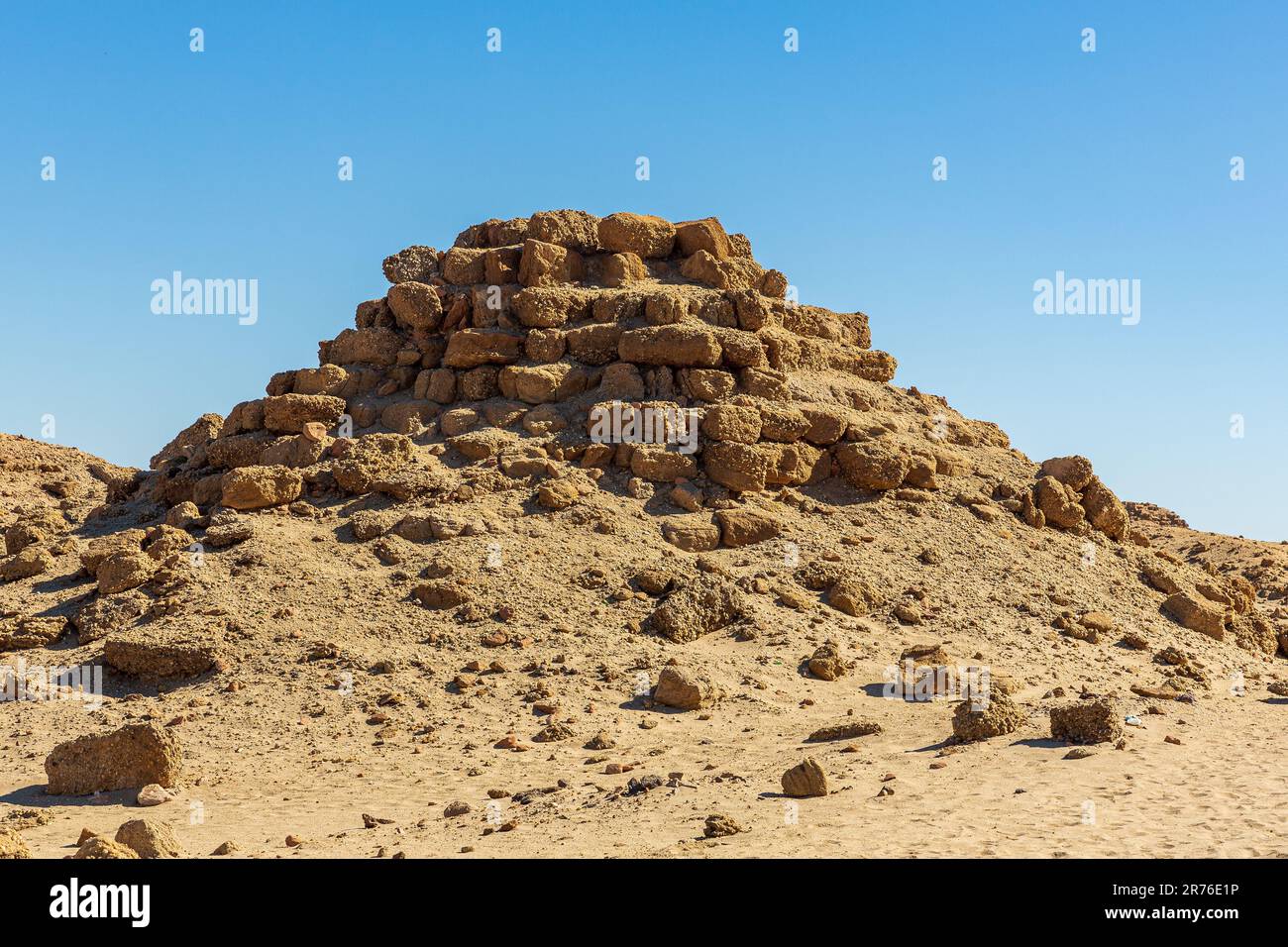 remains of one of the nubian pyramids of the black pharoahs of the napata kingdom of sudan  weatherbeaten and crumbling into the desert Stock Photo