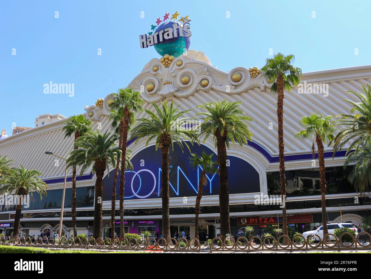 Carnival and Mardi Gras themed Harrah's Hotel & Casino with signs for Donny Osmond's residency Las Vegas Nevada USA Stock Photo