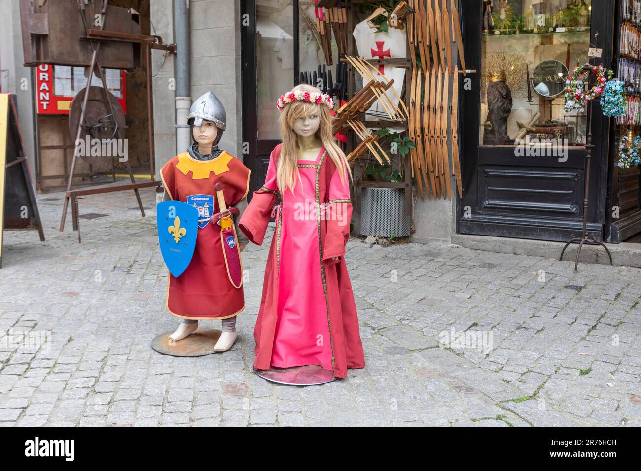 A boy and girl mannequin in medieval costume in the Citadel of Carcassonne Stock Photo