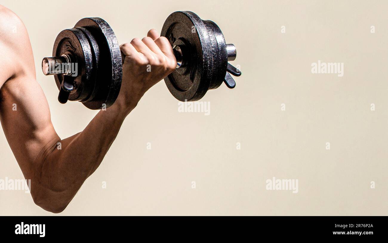 Skinny Guy Hold Dumbbells Up In Hands Thin Man In Sports With skinny-guy-hold-dumbbells-up-in-hands-thin-man-in-sports-with