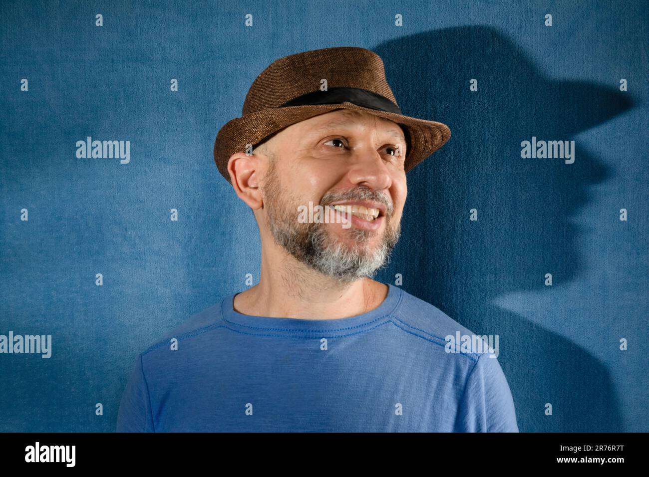 Man in vibrant blue shirt hi-res stock photography and images - Alamy