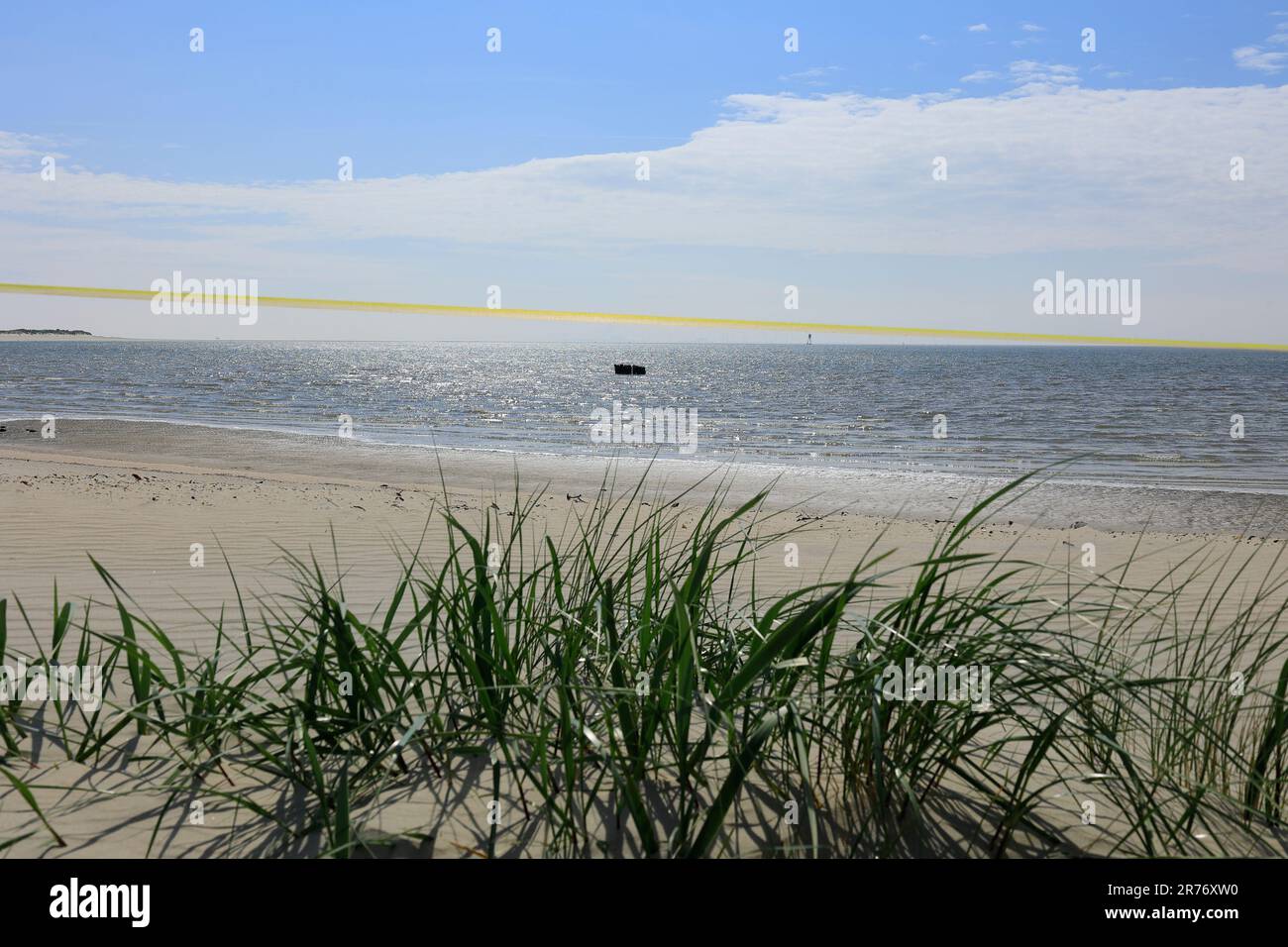 View over a dune on the island of Borkum to the North Sea Stock Photo