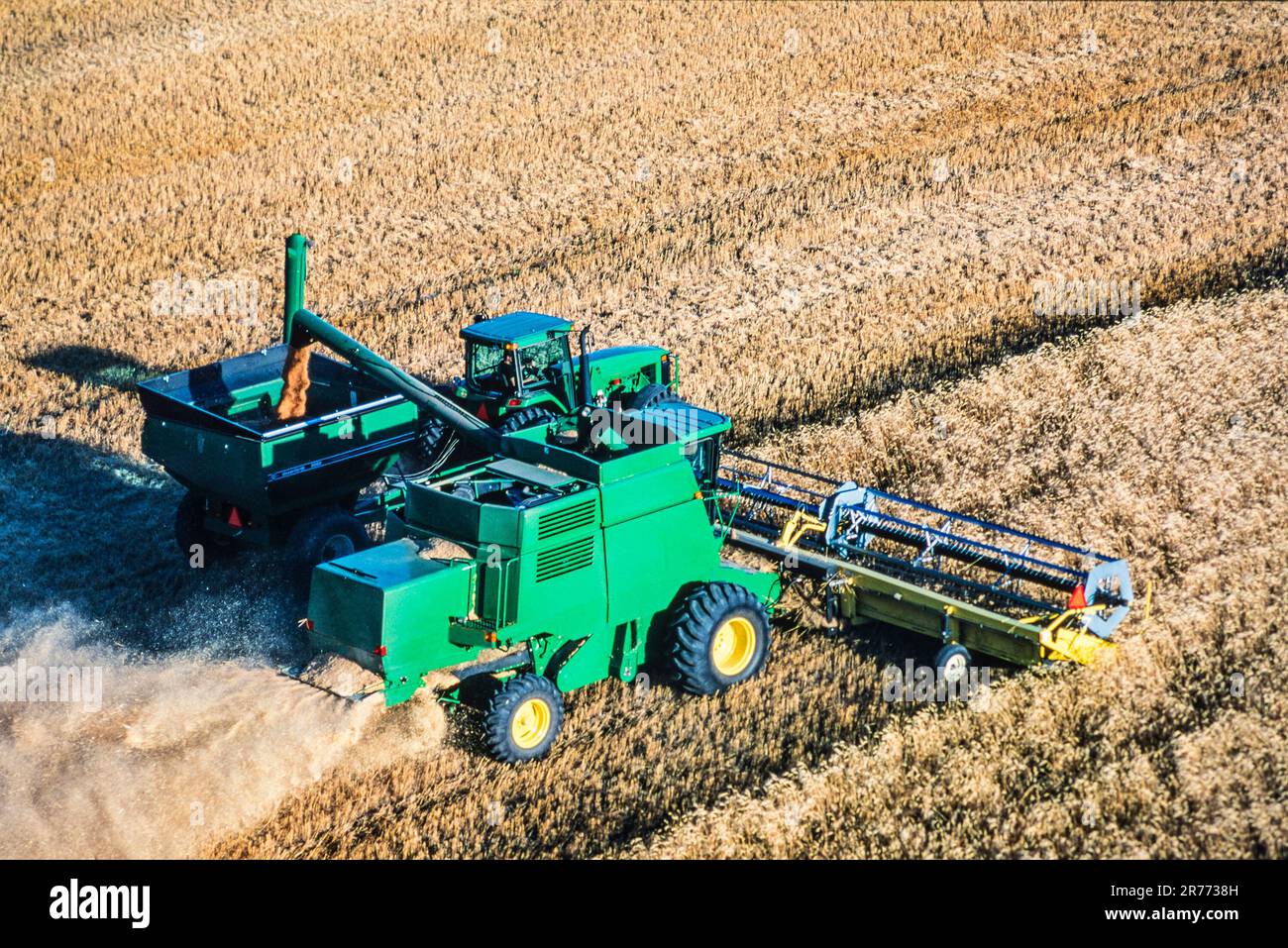 Aerial of harvester at work in Saskatchewan, Canada Stock Photo Alamy
