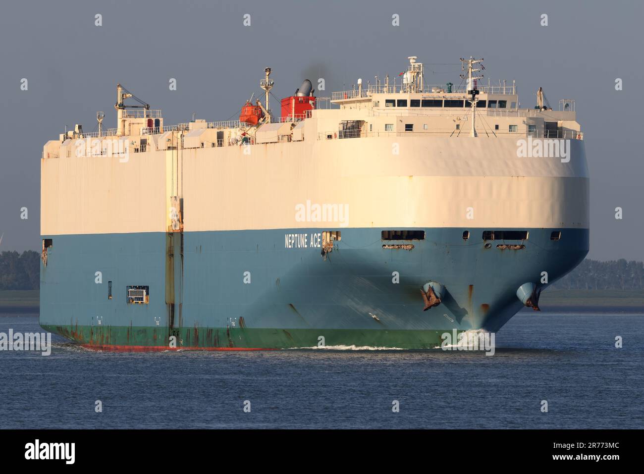 The car carrier Neptune Ace passes Terneuzen on May 19, 2023 on the way to Antwerp. Stock Photo