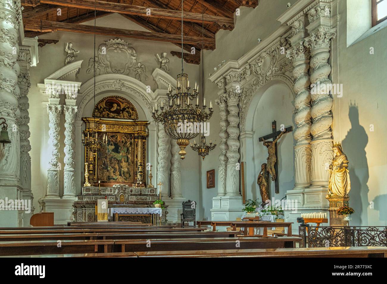 The interior of the baroque church of Santa Caterina d'Alessandria with the baroque style altar with acanthus leaves and twisted stucco columns.Sicily Stock Photo