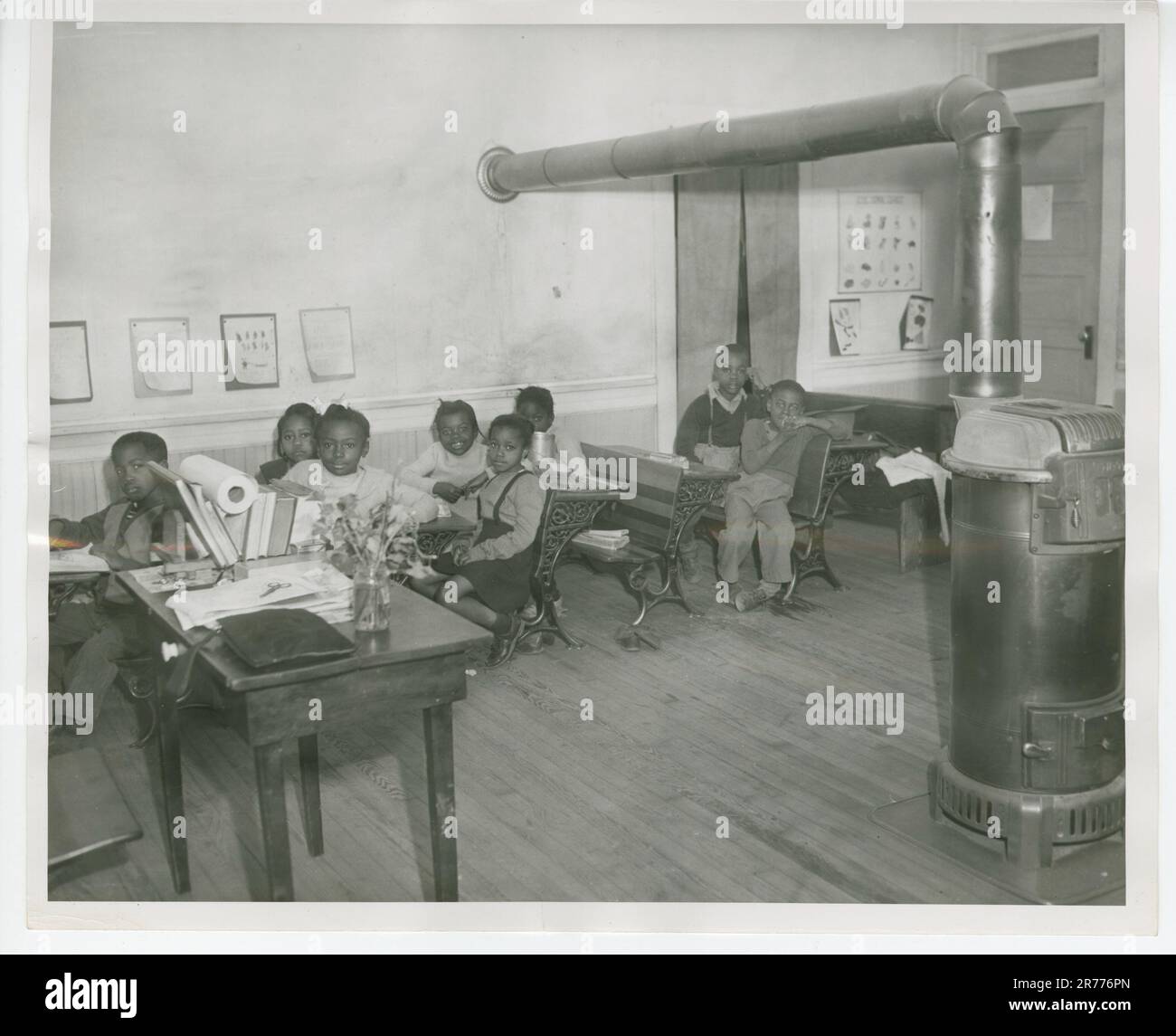 View of a Smithfield School Classroom; 1st and 2nd Grade. This item is a photograph of a Smithfield School classroom for 1st and 2nd; featuring students. This photograph was used as the Defendant's Exhibit No. 155 for the civil rights court case Alice Lorraine Ashley, et al. v. School Board of Gloucester Co. and J. Walter Kenny, Division Superintendent..  Mid Atlantic Region (Philadelphia, PA). Photographic Print. Stock Photo