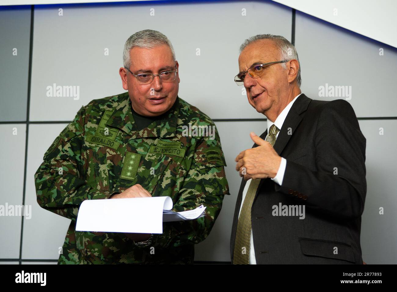 Bogota, Colombia. 13th June, 2023. Colombia's military forces commandr Army General Helder Fernan Giraldo Bonilla speaks with Colombia's minister of defense Ivan Velasquez during a press conference about several topics included the rescue of the 4 children in the Amazon jungle, the ceasefire between the Colombian government and the ELN (Ejercito de Liberacion Nacional) and the Colonel Oscar Davila on June 13, 2023, in Bogota, Colombia. Photo by: Sebastian Barros/Long Visual Press Credit: Long Visual Press/Alamy Live News Stock Photo