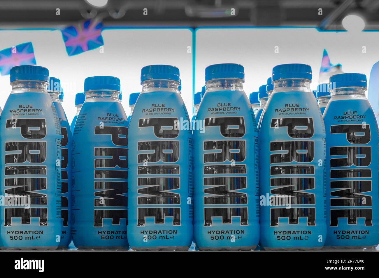 Bottles of Prime hydration energy drink on the shelves of a UK store. A