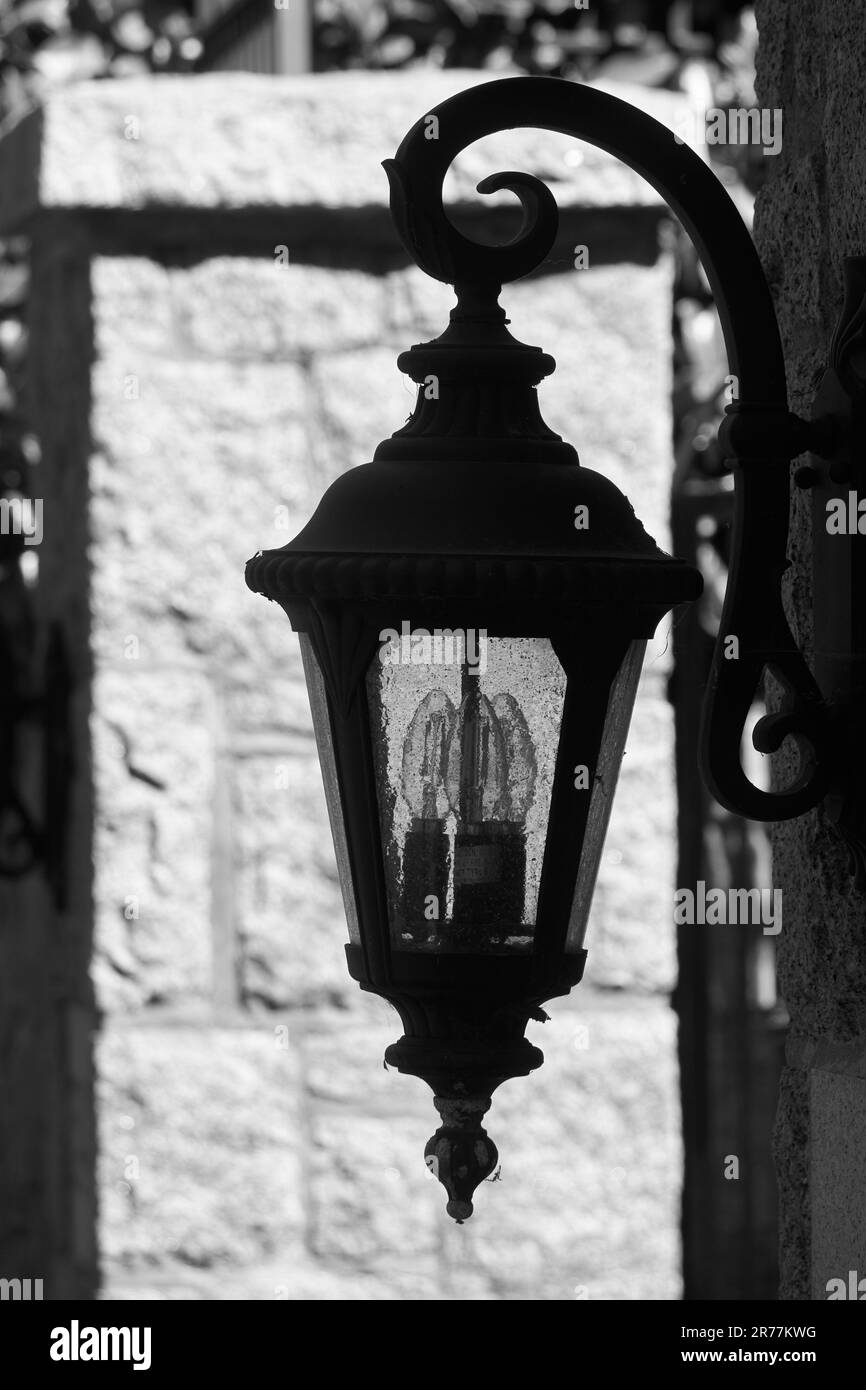 Closeup of an ornate decorative metal lantern in black and white Stock Photo