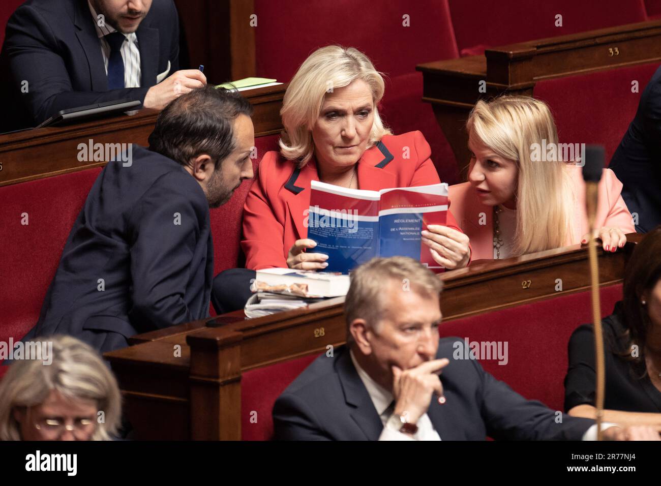 Paris, France. 13th June, 2023. Deputies, Sebastien Chenu, Marine Le Pen and Helene Laporte attend a session of Questions to the Government at the French National Assembly, on June 13, 2023 in Paris, France. Photo by David Niviere/ABACAPRESS.COM Credit: Abaca Press/Alamy Live News Stock Photo