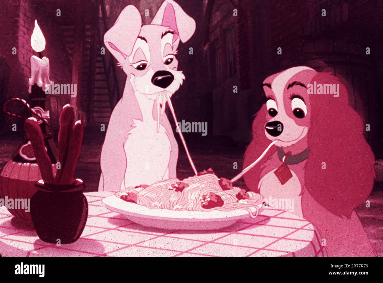 Spaghetti Meal in WALT DISNEY'S LADY AND THE TRAMP 1955 directors CLYDE GERONIMI WILFRED JACKSON and HAMILTON LUSKE from the story by Ward Greene Walt Disney productions / Buena Vista Film Distribution Company Stock Photo
