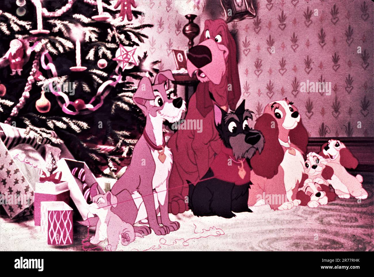 Christmas Group of Dogs in WALT DISNEY'S LADY AND THE TRAMP 1955 directors CLYDE GERONIMI WILFRED JACKSON and HAMILTON LUSKE from the story by Ward Greene Walt Disney productions / Buena Vista Film Distribution Company Stock Photo