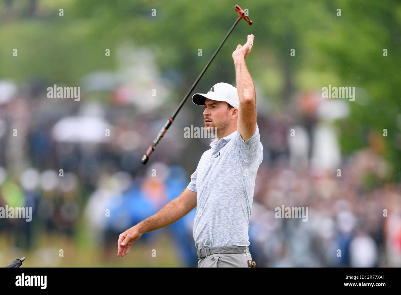 TORONTO, ON JUNE 11 Nick Taylor of Canada throws is putter in the