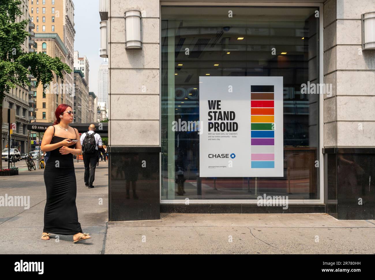 A sign in the window of a Chase bank in the Flatiron neighborhood in New York displays rainbow colors and their support of Gay Pride, seen on Tuesday, June 6, 2023.  (© Richard B. Levine) Stock Photo