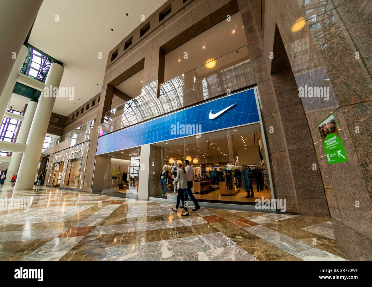 People walk past the NIke store in the Brookfield Place development in Lower Manhattan in New York on Thursday, June 8, 2023. (© Richard B. Levine) Stock Photo