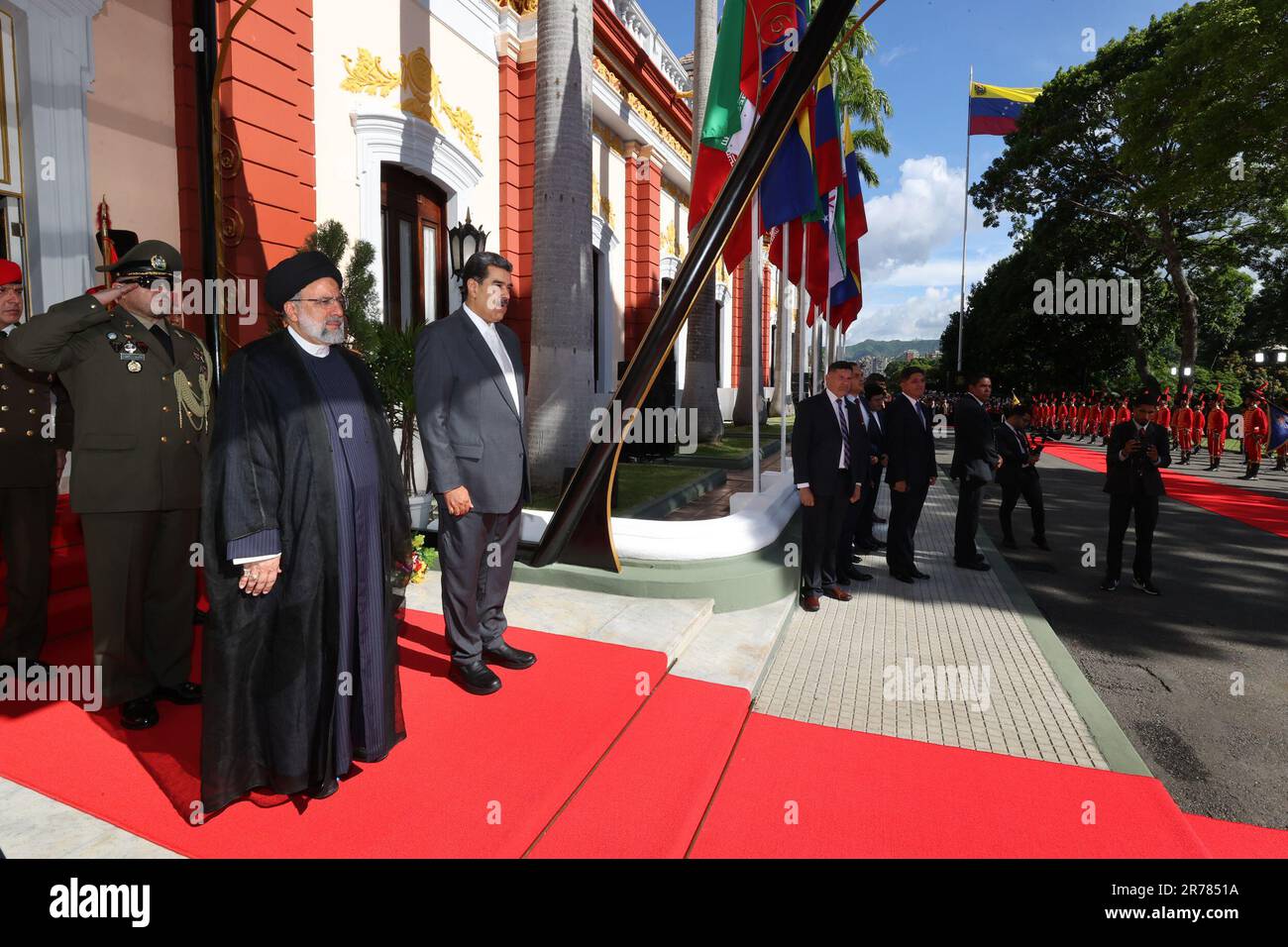 June 12, 2023, Caracas, Tehran, Venezuela: The president of Venezuela, NICOLAS MADURO (R), receives the president of Iran, EBRAHIM RAISI (C), at the presidential palace of Miraflores. Raisi landed this 12 June in Venezuela, at the Simon Bolivar International Airport, in Maiquetia, which serves Caracas, where he was received with honors by a delegation headed by Venezuelan Foreign Minister Yvan Gil. Venezuela is the first stop for the Iranian president on his tour of Latin America, which also includes Cuba and Nicaragua. (Credit Image: © Iranian Presidency via ZUMA Press Wire) EDITORIAL USAGE O Stock Photo