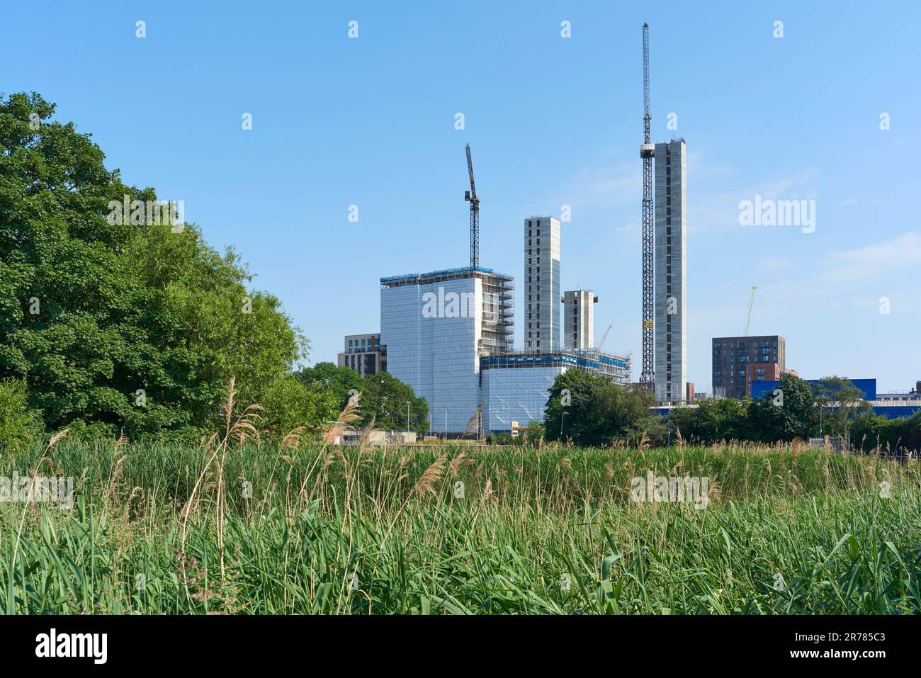 The new Abbey Quay housing project under construction at Barking, East London UK, viewed from the River Roding Stock Photo