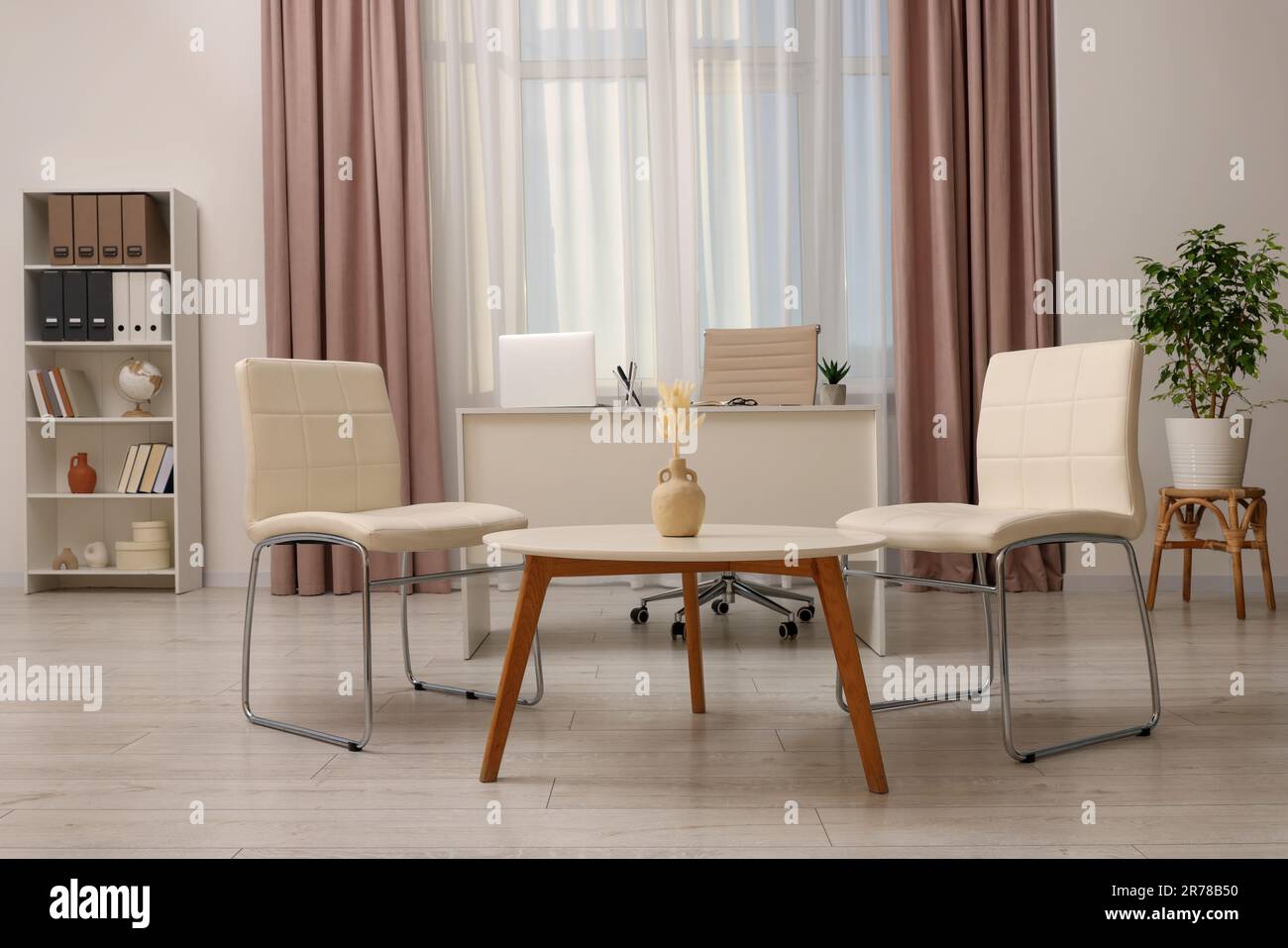 Modern office with comfortable waiting area and reception desk