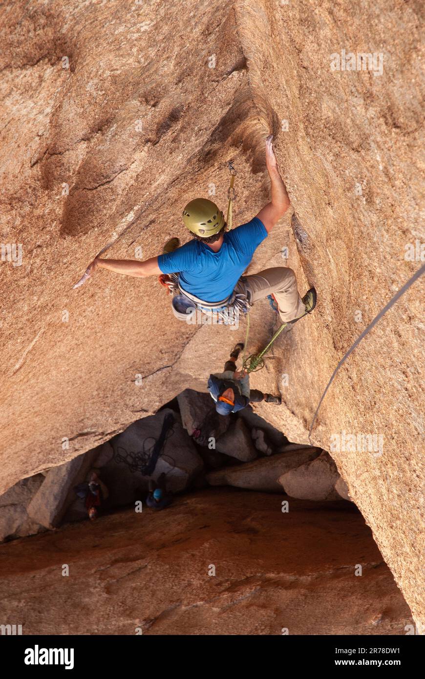 Male rock climber ascending steep rock. Cochise Stronghold, Arizona Stock Photo