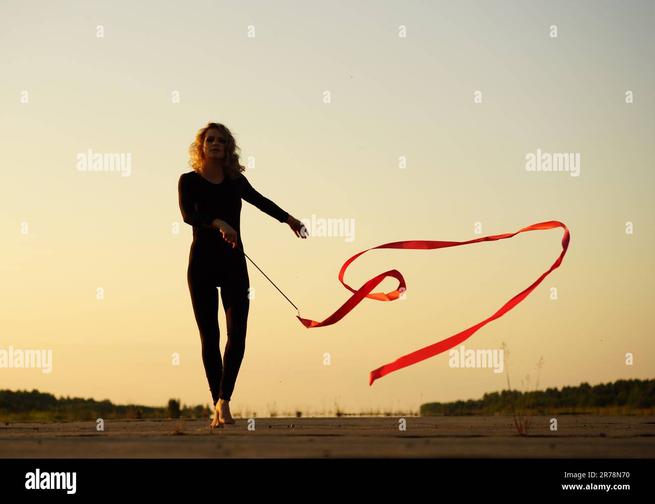 Woman art gymnastics ribbon silhouette hi-res stock photography and ...