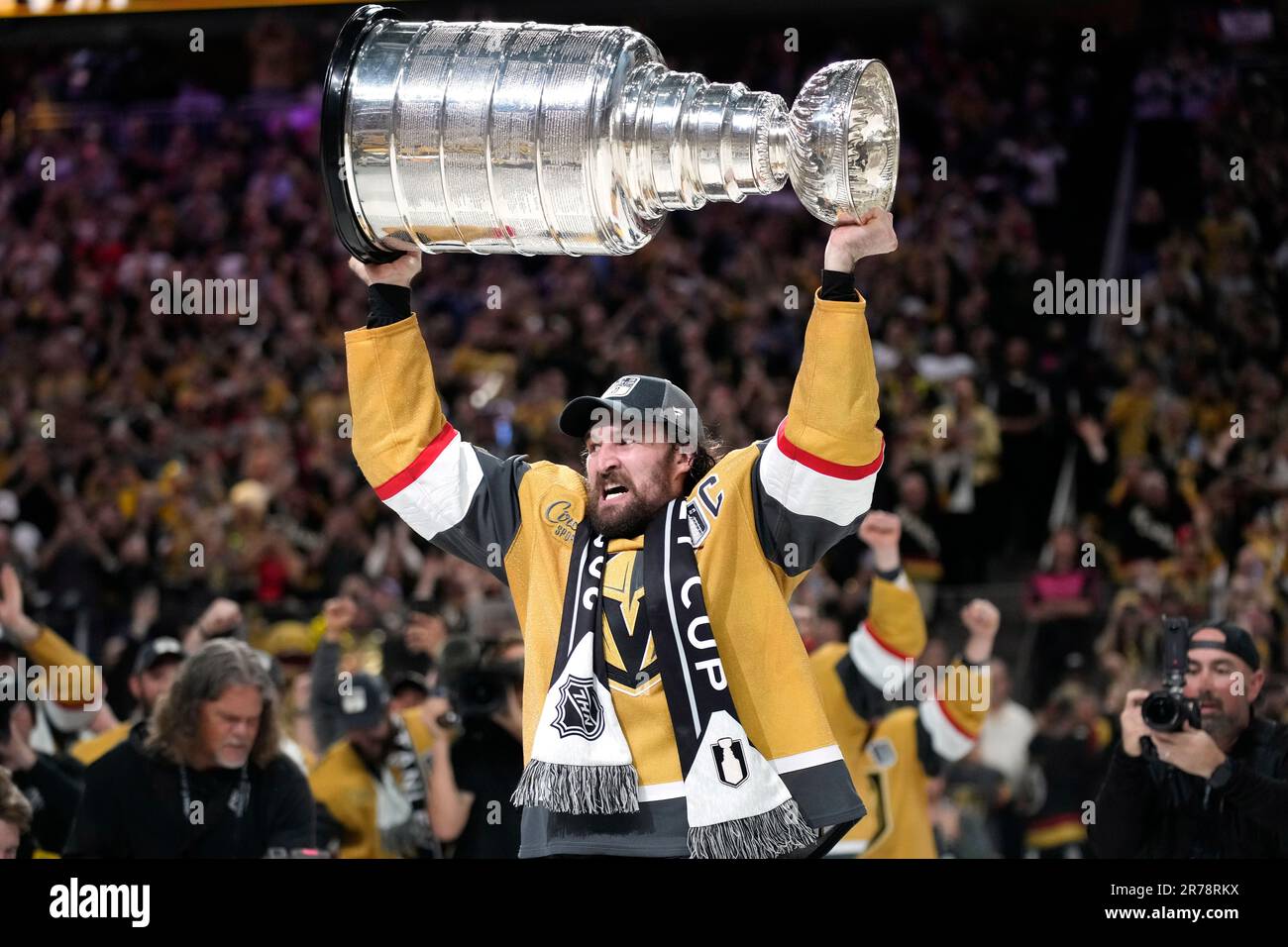 https://c8.alamy.com/comp/2R78RKX/vegas-golden-knights-right-wing-mark-stone-hoists-the-stanley-cup-after-the-knights-defeated-the-florida-panthers-9-3-in-game-5-of-the-nhl-hockey-stanley-cup-finals-tuesday-june-13-2023-in-las-vegas-the-knights-won-the-series-4-1-ap-photojohn-locher-2R78RKX.jpg