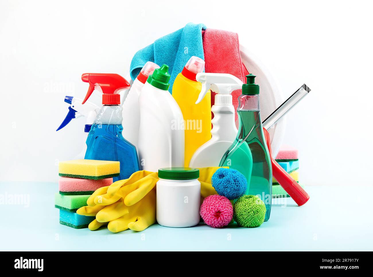 Cleaning products. Bottles, rubber gloves and cleaning sponge.  Cleaning supplies collection. Housework concept Stock Photo