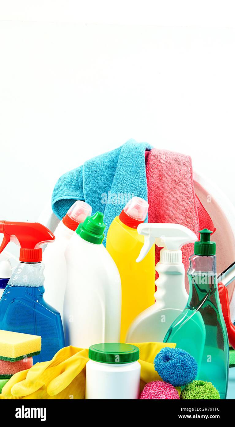 Cleaning products. Bottles, rubber gloves and cleaning sponge.  Cleaning supplies collection. Housework concept Stock Photo