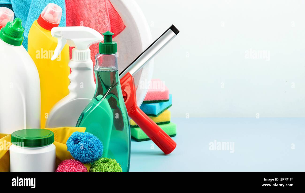 Cleaning products. Bottles, rubber gloves and cleaning sponge.  Cleaning supplies collection. Housework concept Stock Photo