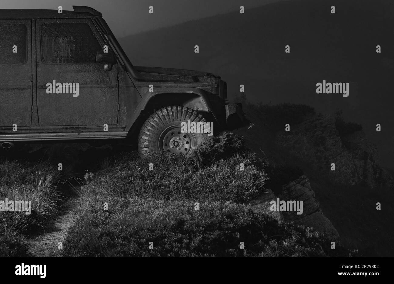 Offroad 4x4 concept. Offroad travel on mountain road. Water splash in