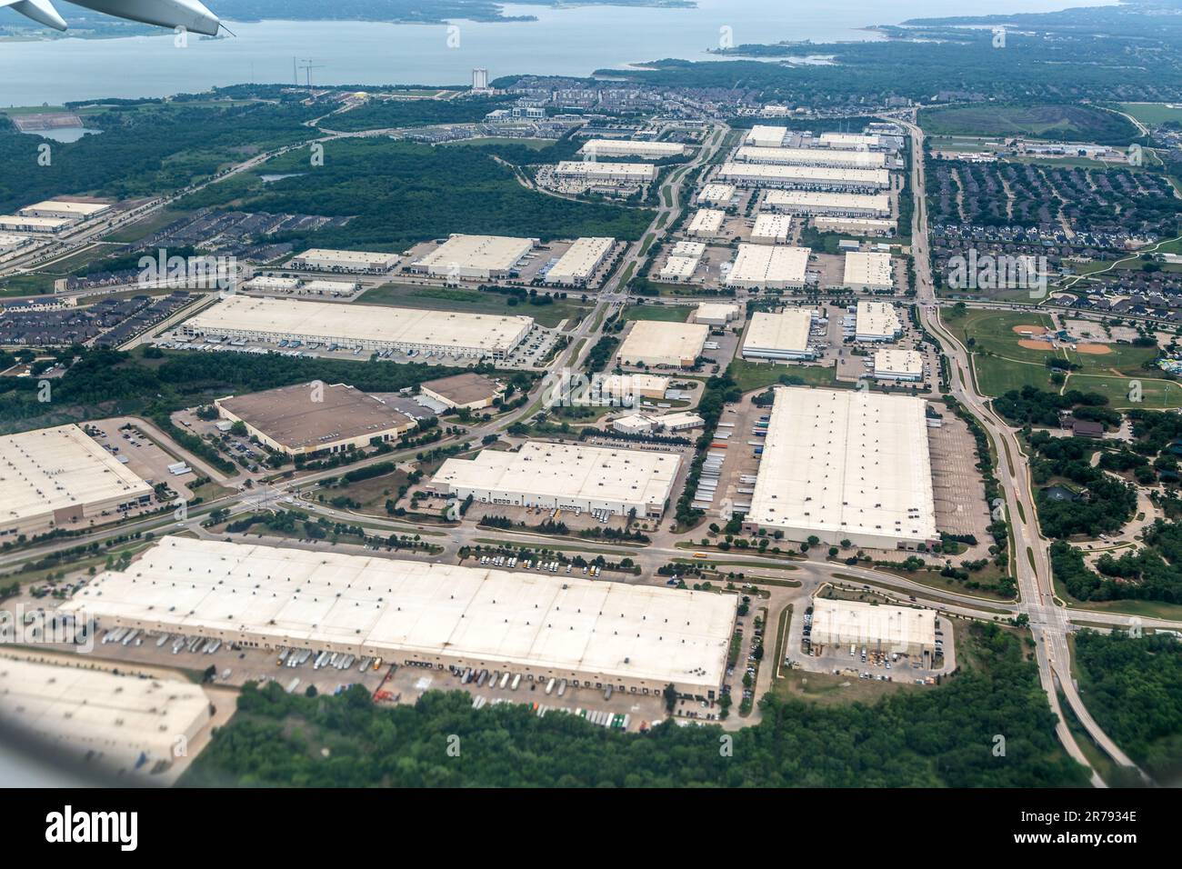 Oblique angle aerial view of large distribution centre logistics