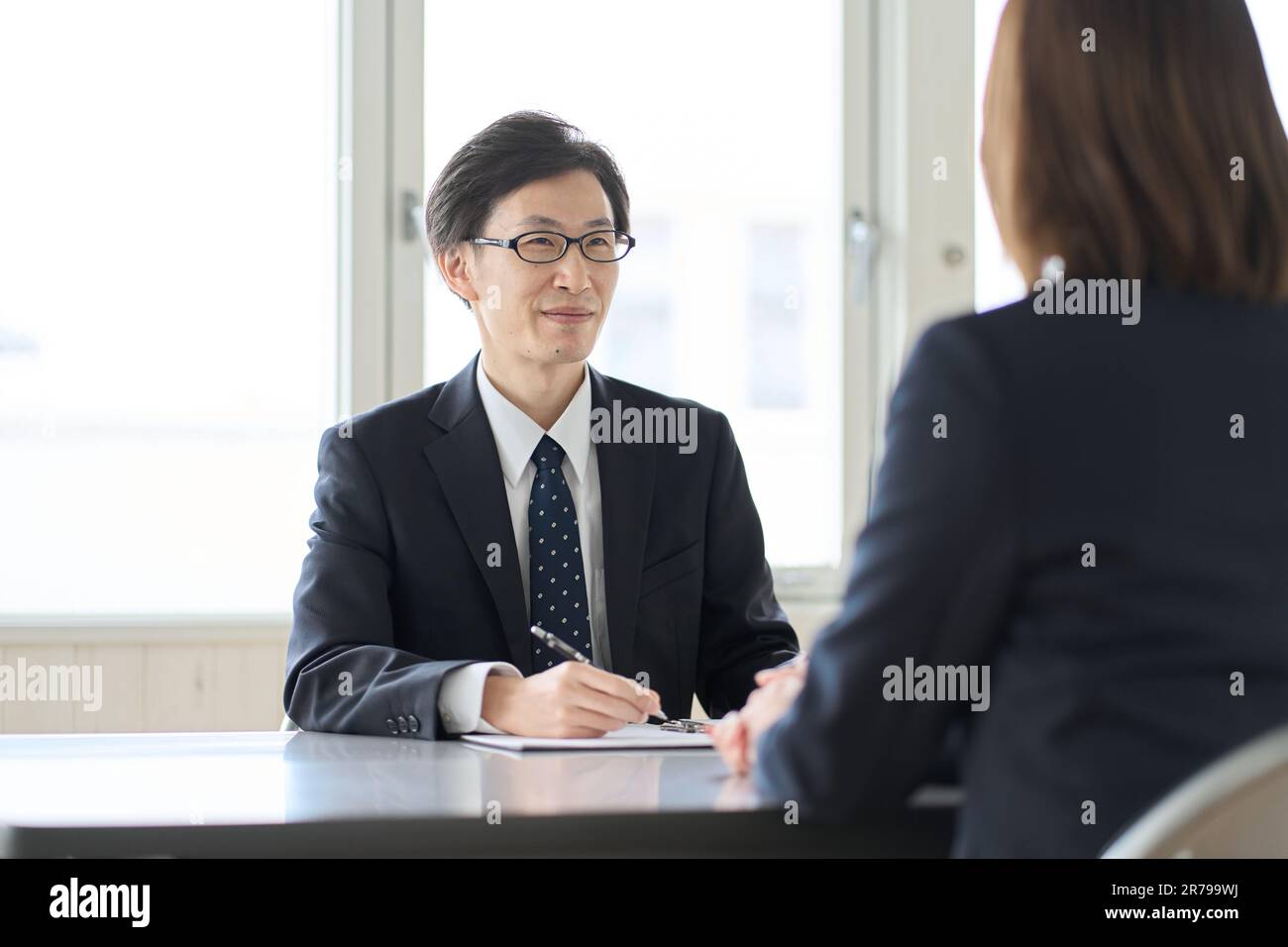 Asian male tax accountant receiving tax consultation Stock Photo Alamy