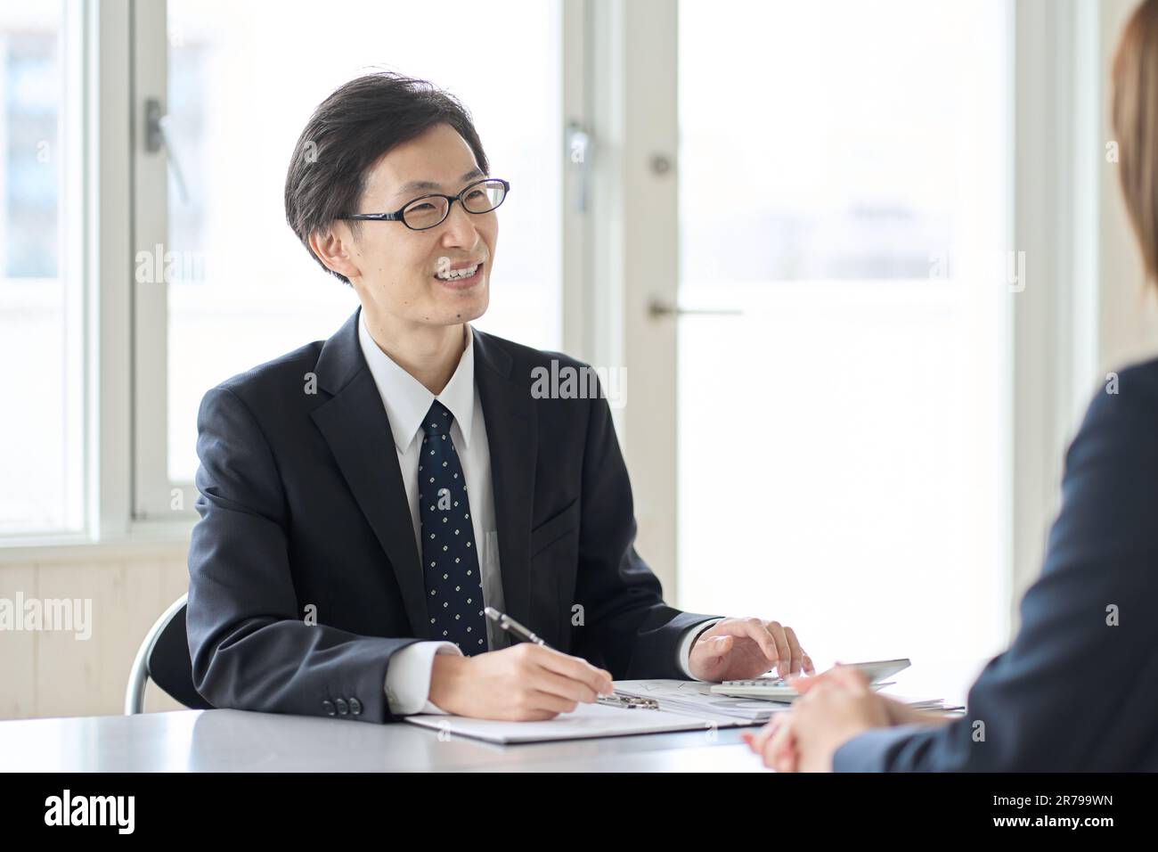 Asian male tax accountant receiving tax consultation Stock Photo Alamy