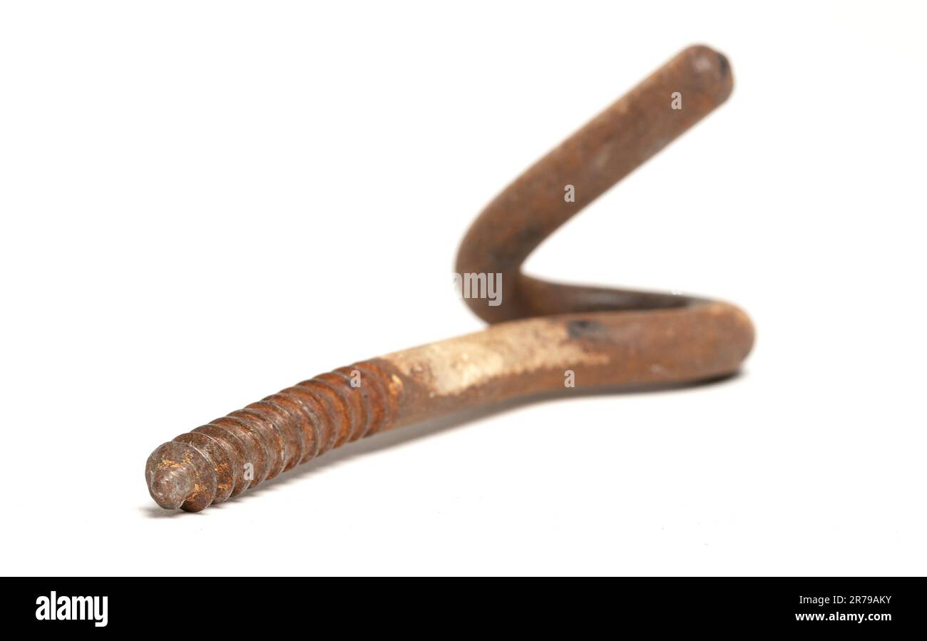 Rusty hook for hanging something in the ceiling, close-up, isolated ...