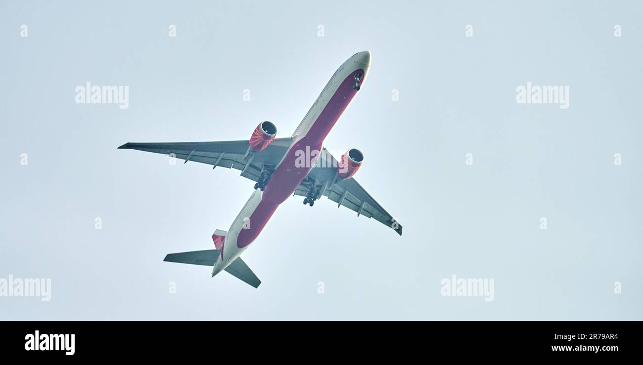 Airplane flying in blue sky copy space, large passenger plane flies in ...