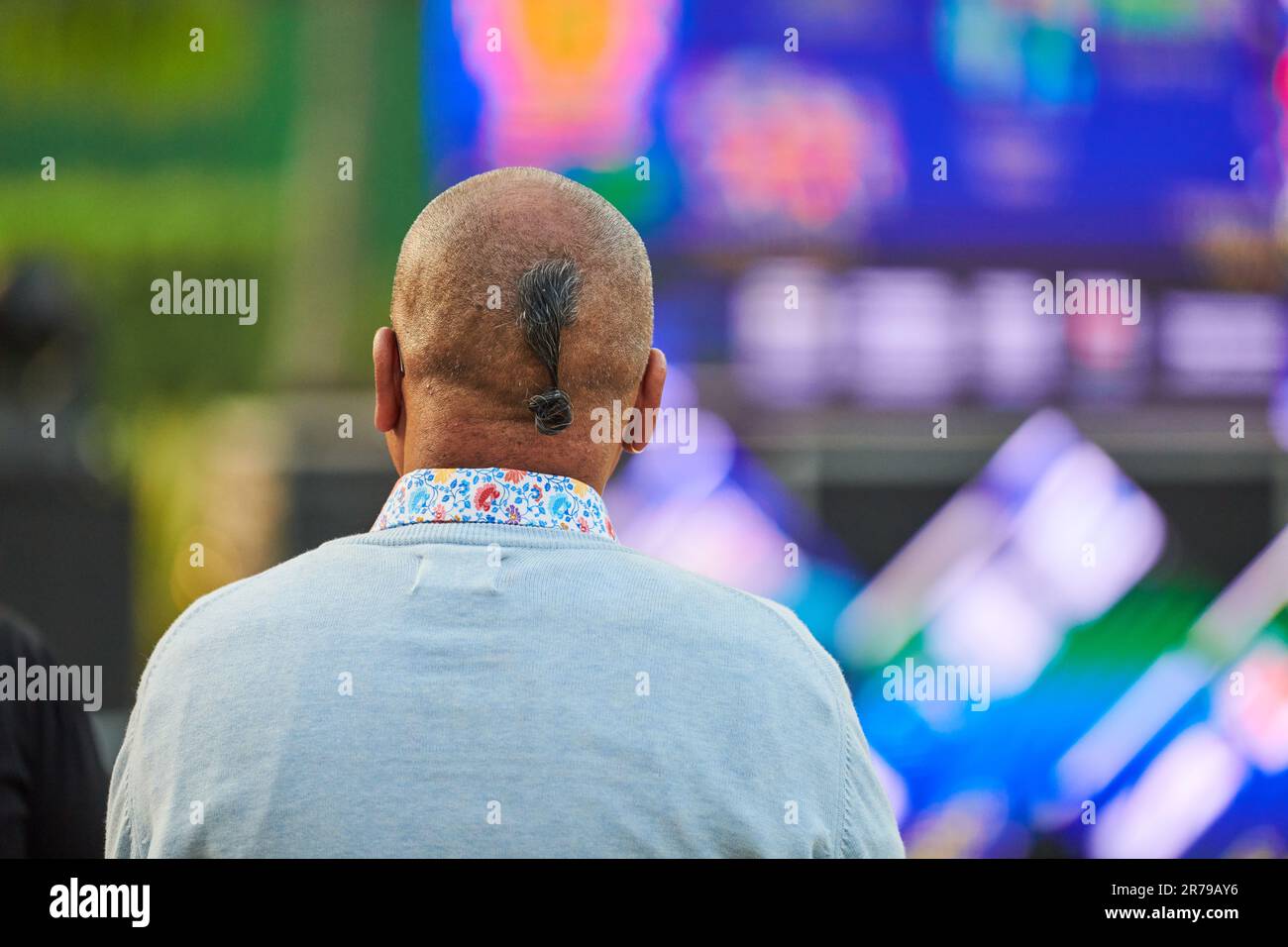 Back view of adult man head with ukrainian chub haircut at outdoor ...